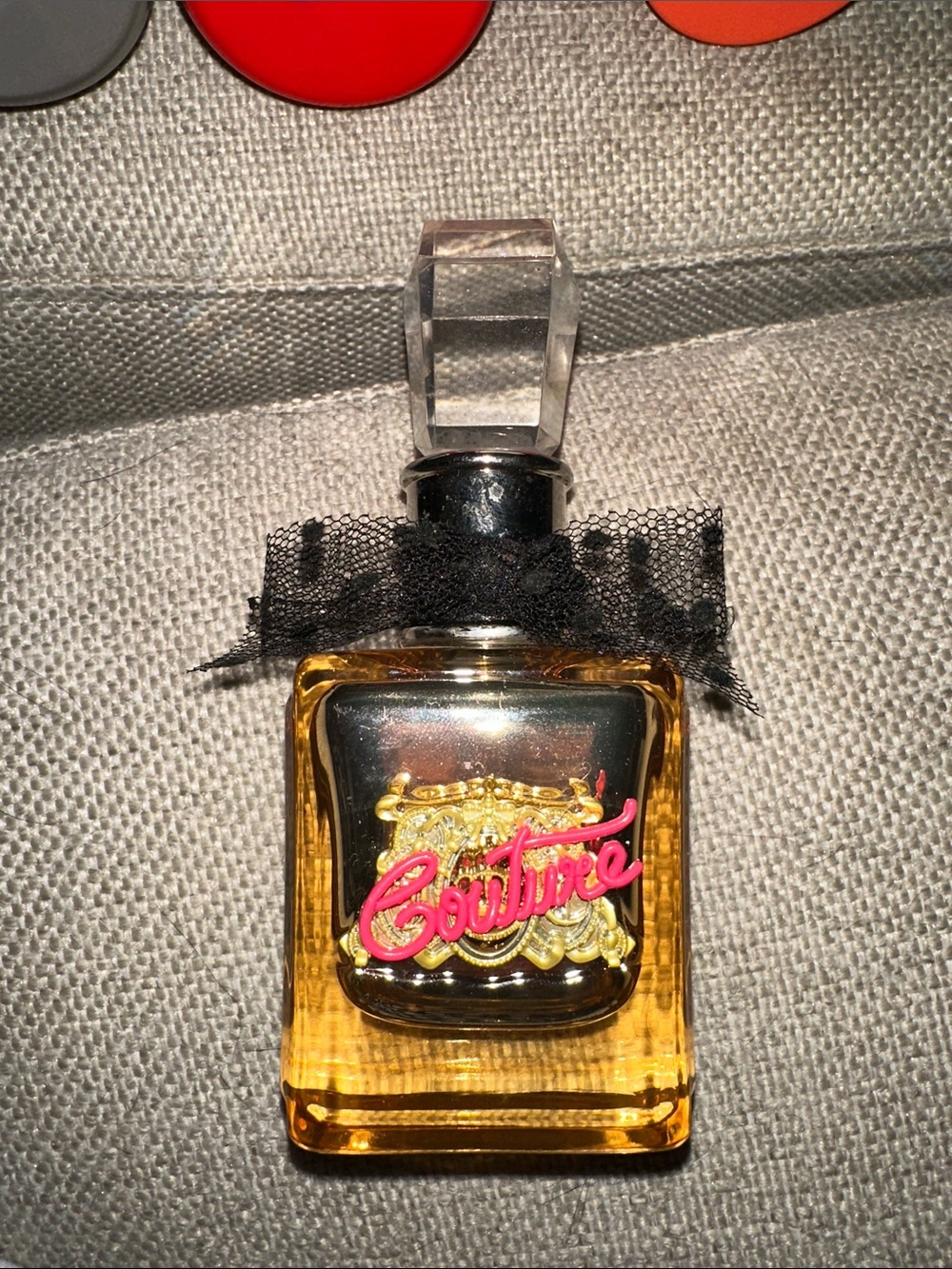 Juicy Couture Amber Perfume Bottle with Pink Logo & Black Lace